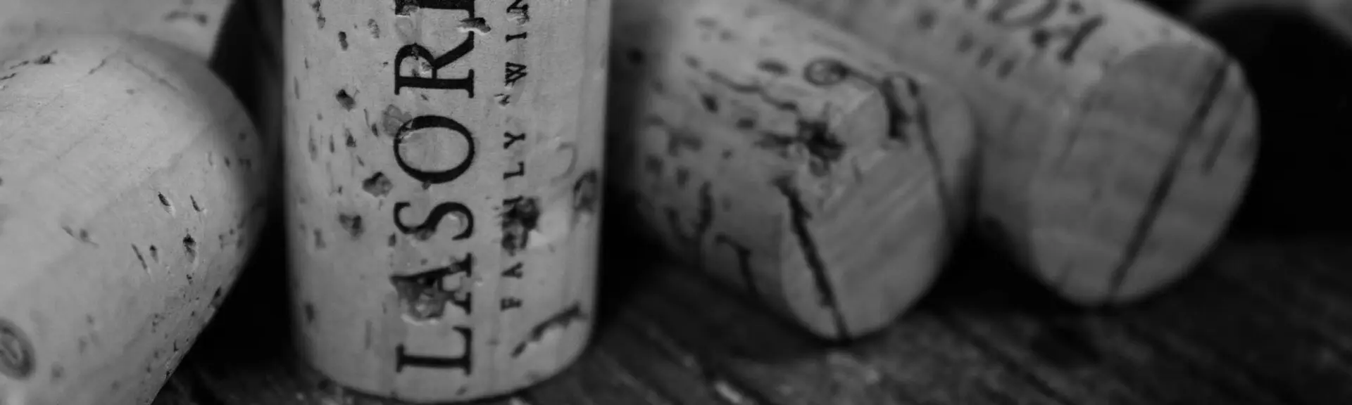 A close up of some wine corks on the floor